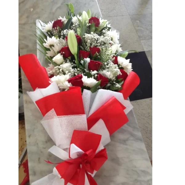 red roses with white lilly